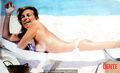 Italian journalist and television host Cristina Parodi sunbathing topless in