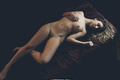 Claudia Lion naked on a bed photoset by Adolfo Valente