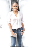 Christina Milian in jeans and white blouse