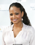 Christina Milian in jeans and white blouse