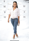 Christina Milian in jeans and white blouse