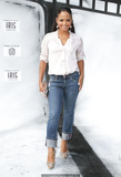 Christina Milian in jeans and white blouse