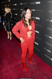 Christina Milian sexy in red pants, bra and jacket