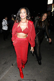 Christina Milian sexy in red pants, bra and jacket