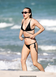 Chloe Sevigny in black bikini on a beach in Miami - December 07, 2018