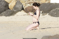 Charlotte Gainsbourg in black bikini on the beach in St. Barts - March 11, 2019