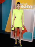 Chanel Iman in short lemon dress, shows her long legs