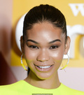 Chanel Iman in short lemon dress, shows her long legs