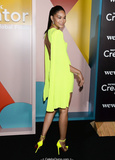 Chanel Iman in short lemon dress, shows her long legs