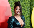 Cassie Ventura legs and cleavage in green dress