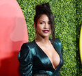 Cassie Ventura legs and cleavage in green dress