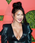 Cassie Ventura legs and cleavage in green dress