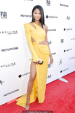 Chanel Iman in yellow dress at The Daily Front Row's 5th Annual Fashion Los
