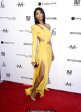 Chanel Iman in yellow dress at The Daily Front Row's 5th Annual Fashion Los