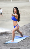 Casey Batchelor in blue bikini filming for her yoga blitz app in Tenerife - May