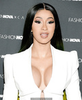 Cardi B legs and cleavage at Fashion Nova x Cardi B Collection Launch Event in