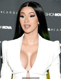 Cardi B legs and cleavage at Fashion Nova x Cardi B Collection Launch Event in