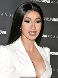 Cardi B legs and cleavage at Fashion Nova x Cardi B Collection Launch Event in