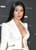 Cardi B legs and cleavage at Fashion Nova x Cardi B Collection Launch Event in