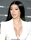 Cardi B legs and cleavage at Fashion Nova x Cardi B Collection Launch Event in