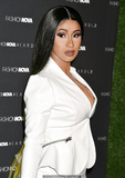 Cardi B legs and cleavage at Fashion Nova x Cardi B Collection Launch Event in