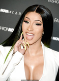 Cardi B legs and cleavage at Fashion Nova x Cardi B Collection Launch Event in