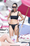 Cara Santana in black bikini on the beach in Miami - November 07, 2019