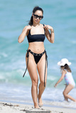 Cara Santana in black bikini on the beach in Miami - November 07, 2019