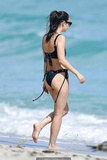 Cara Santana in black bikini on the beach in Miami - November 07, 2019