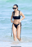 Cara Santana in black bikini on the beach in Miami - November 07, 2019