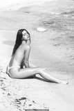 Carla Guetta nude on a beach photoshot by Delphine Brunner