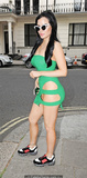 Carla Howe without underwear in short green dress in London - June 23, 2018