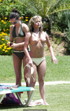 Brooke Kinsella in bikini and topless on a beach