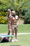 Brooke Kinsella in bikini and topless on a beach