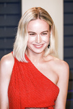 Brie Larson in red dress at 2019 Vanity Fair Oscar Party in Beverly Hills -