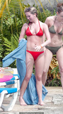 Brooke Kinsella sexy in red bikini poolside