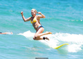 Bonnie Sveen in bikini surfing at Bondi Beach - January 15, 2015