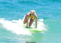 Bonnie Sveen in bikini surfing at Bondi Beach - January 15, 2015
