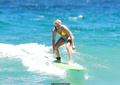 Bonnie Sveen in bikini surfing at Bondi Beach - January 15, 2015