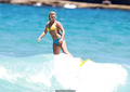 Bonnie Sveen in bikini surfing at Bondi Beach - January 15, 2015