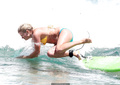 Bonnie Sveen in bikini surfing at Bondi Beach - January 15, 2015