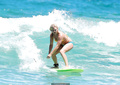 Bonnie Sveen in bikini surfing at Bondi Beach - January 15, 2015