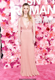 Betty Gilpin in pink dress at Isn't It Romantic premiere in LA - February 11,