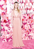 Betty Gilpin in pink dress at Isn't It Romantic premiere in LA - February 11,