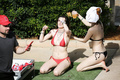 Bella Thorne in red bikini with Dani in black at the pool in Miami - March 13,