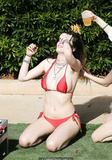 Bella Thorne in red bikini with Dani in black at the pool in Miami - March 13,