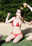 Bella Thorne in red bikini with Dani in black at the pool in Miami - March 13,