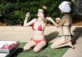 Bella Thorne in red bikini with Dani in black at the pool in Miami - March 13,