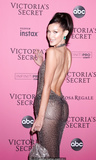 Bella Hadid braless in see through dress