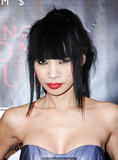 Bai Ling legs and cleavage in tight dress